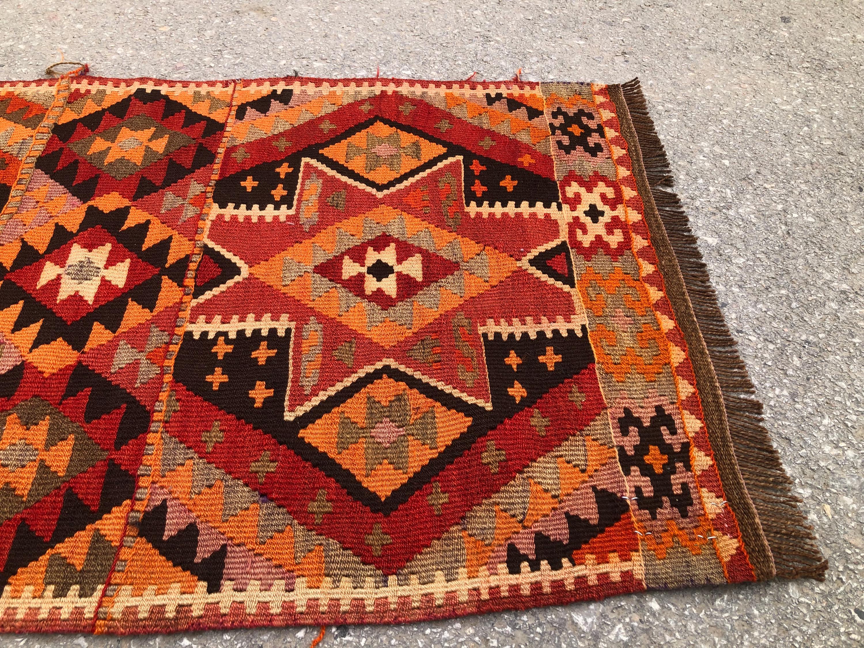 Handwoven Turkish Kilim Rug: Tribal Wool Flatweave, Red Orange Geometric